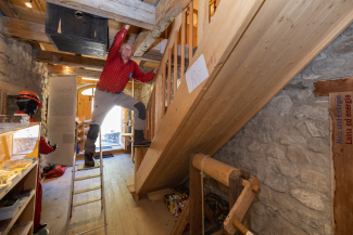 Constantly on the move: Peder takes care of a broken screen in the museum.